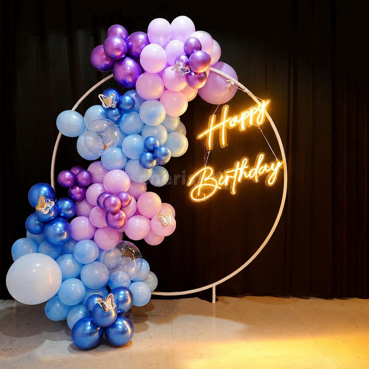 balloon garland on golden ring stand