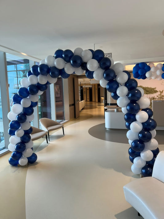 white and nave blue colour balloon arch