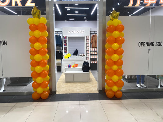 Yellow￼and orange colour balloon arch stands